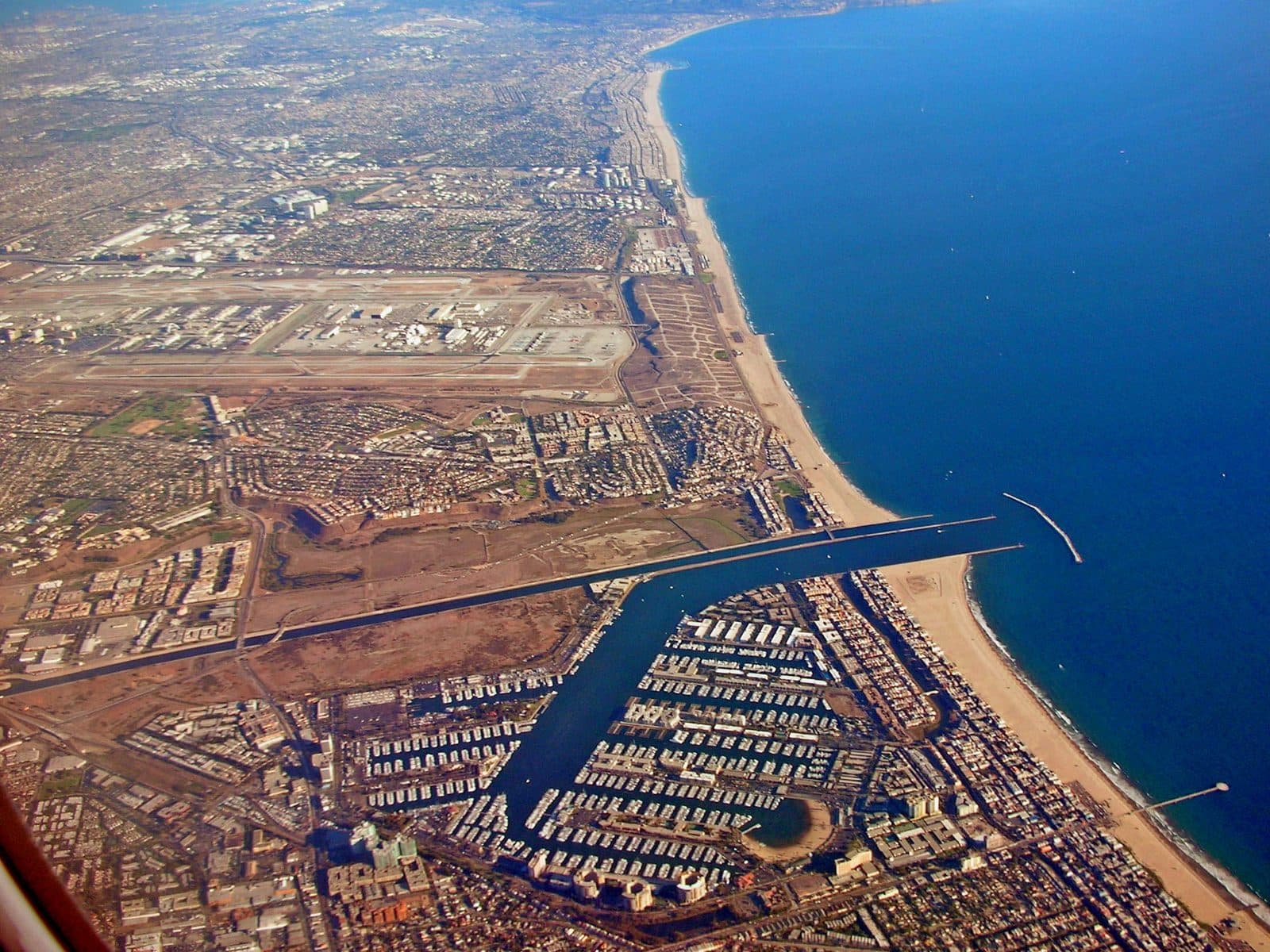 Mobile car detailing in Marina del Rey — harbor aerial view Aerial view of the Marina del Rey harbor, boat slips and coastline along Santa Monica Bay in Los Angeles